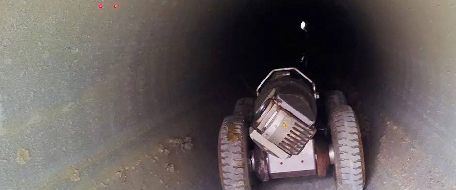 A mobile equipment inside a pipe